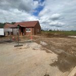 Plot 8 putting up fencing